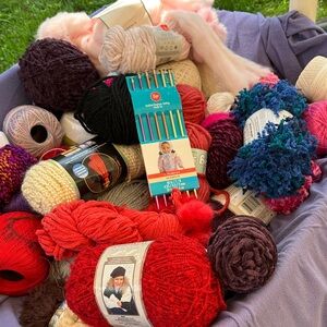 Vibrant Yarn Collection with Knitting Needles